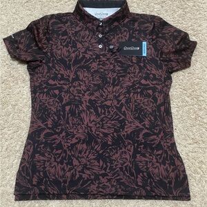 Brand new with tags Good Good women’s golf polo, medium. Nice Blooms pattern.